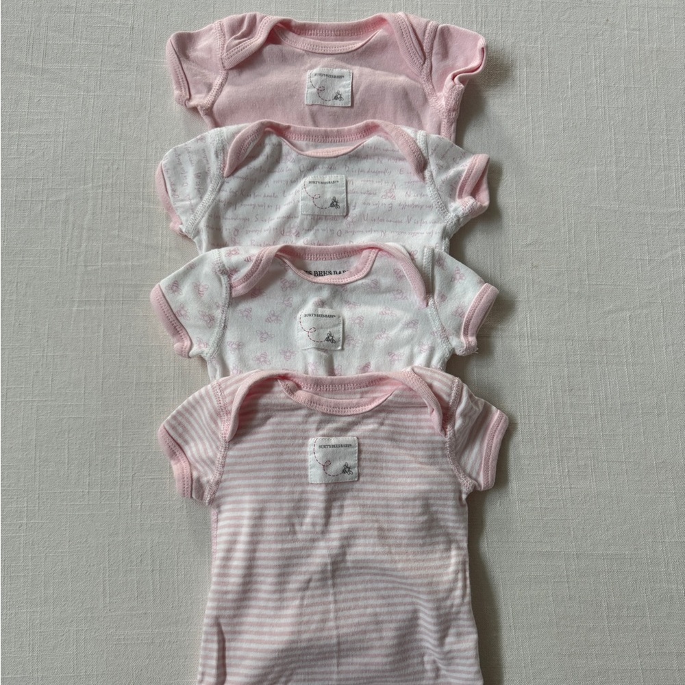 Burt’s Bees 100% organic cotton bodysuits, pack of 4. Size 0-3 months.